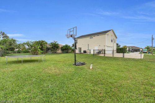 911 Apple Ave, Lehigh Acres FL 33971-6441 exterior