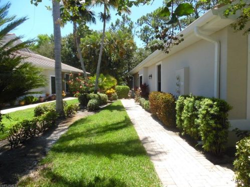 7735 Woodbrook Cir, Naples, FL 34104-7438