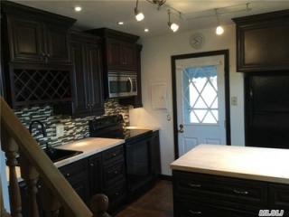 100 Saddle Ln, Plainedge, NY 11756-2627