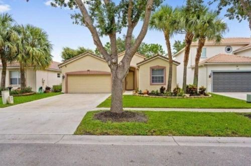 122 Seminole Lakes Dr, West Palm Beach, FL 33411-4210
