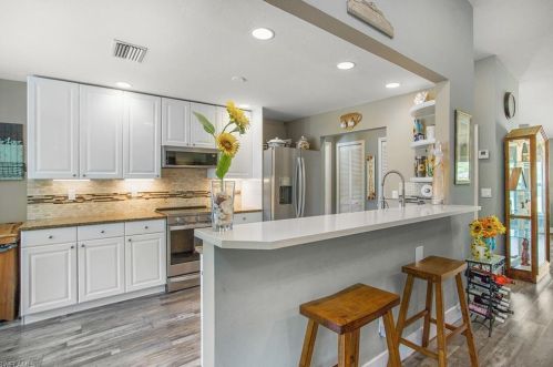 5761 Standing Oaks Ln, Naples, FL 34119-1235