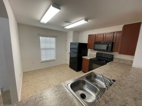 128 Shadow Lakes Dr, Lehigh Acres FL  33974-0803 exterior