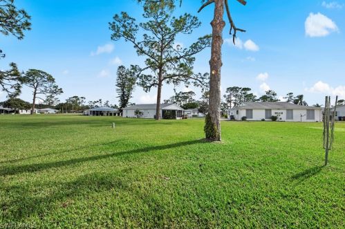 18 Dawn Flower Cir, Lehigh Acres FL 33936-7355 exterior