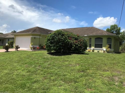516 Empire Ave, Lehigh Acres, FL 33974-9518