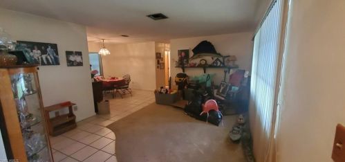 109 Lake Dr, Lehigh Acres, FL 33936-6907