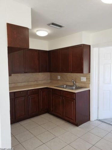 317 Canyon Dr, Lehigh Acres, FL 33936-7129