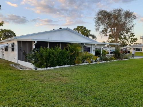 50 Dawn Flower Cir, Lehigh Acres FL 33936-0073 exterior