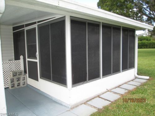 25 Dawn Flower Cir, Lehigh Acres FL 33936-7356 exterior