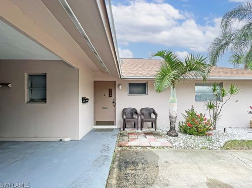 279 Rosewood Ct, Lehigh Acres FL  33936-1448 exterior