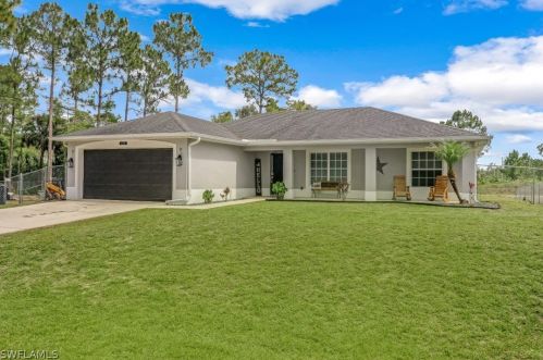 620 Ames St, Lehigh Acres, FL 33974-9559