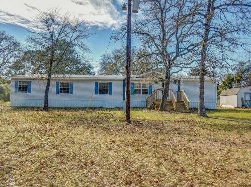 355 Travis Rd, Hills, TX 78659-4832