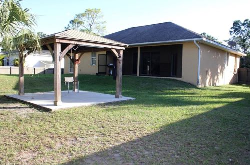 709 Connecticut Ln, Lehigh Acres FL 33936-7803 exterior