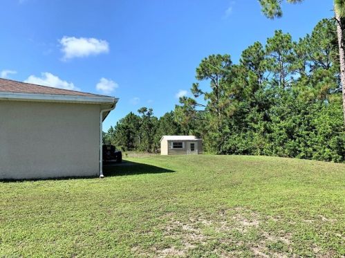 712 Holmes Ave, Lehigh Acres FL 33974-5500 exterior