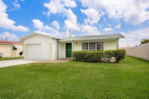 218 3rd Pl, Dania Beach FL  33004-4127 exterior