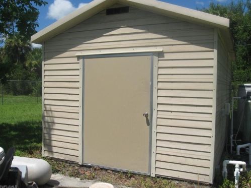 517 Plumosa Ave, Lehigh Acres FL 33972-7910 exterior