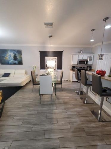 395 Shadow Lakes Dr, Lehigh Acres FL  33974-0808 exterior