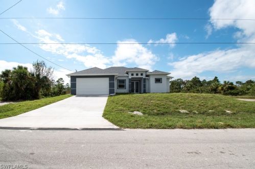 738 Cardinal St, Lehigh Acres, FL 33974-5595