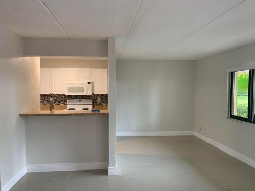 707 Meadows Cir, Boynton Beach, FL 33436-8927
