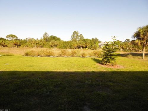 213 Shadow Lakes Dr, Lehigh Acres FL  33974-0806 exterior