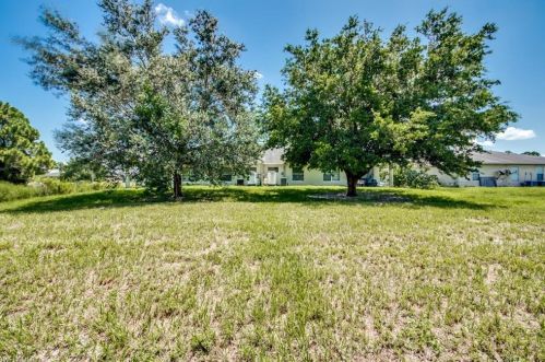 217 Ivan Ave, Lehigh Acres FL 33973-2011 exterior