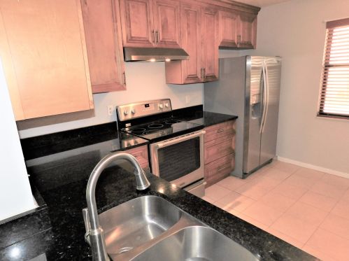2402 Lakeview Cir, West Palm Beach FL  33411-8743 exterior