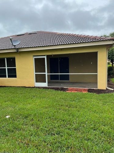 9315 Aegean Cir, Lehigh Acres, FL 33936-6011