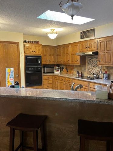 303 Owl Tree Trl, Greenville TX  75402-4214 exterior