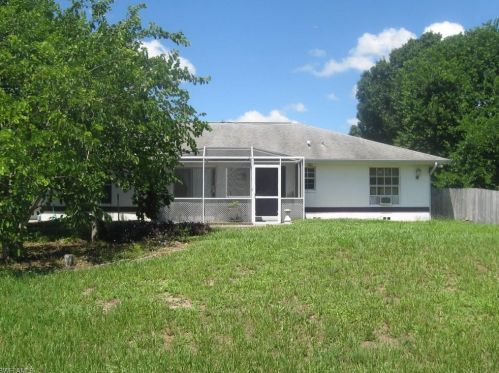 517 Plumosa Ave, Lehigh Acres, FL 33972-7832