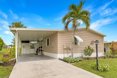 62 Le Mans Dr, Naples, FL 34112-9126