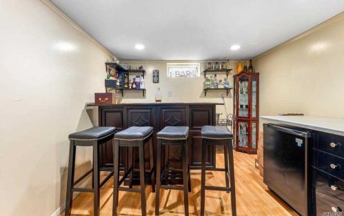 32 Leibrock Ave, North Lindenhurst NY 11757-1825 exterior