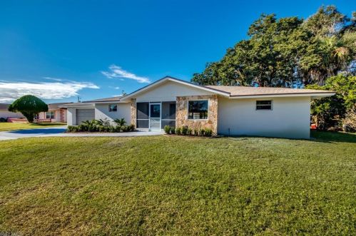 1607 Country Club Pkwy, Lehigh Acres, FL 33936-5309