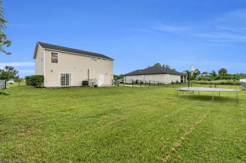 911 Apple Ave, Lehigh Acres FL 33971-6441 exterior