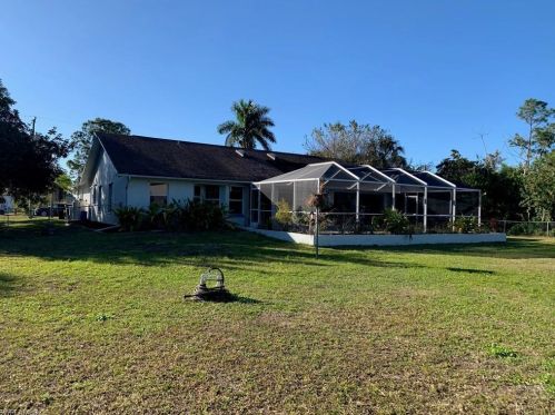 414 Palmetto Ave, Lehigh Acres FL 33972-7859 exterior