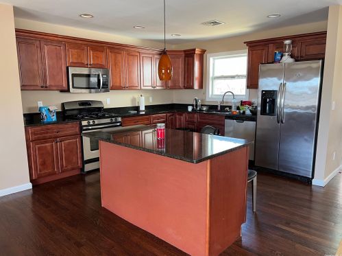 12 Kennedy Dr, South Setauket, NY 11720-3023