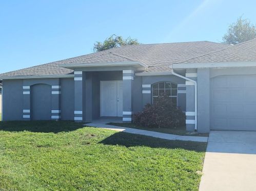 675 Woodcrest Dr, Lehigh Acres, FL 33972-1034