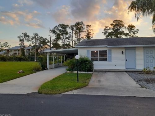 50 Dawn Flower Cir, Lehigh Acres FL 33936-0073 exterior