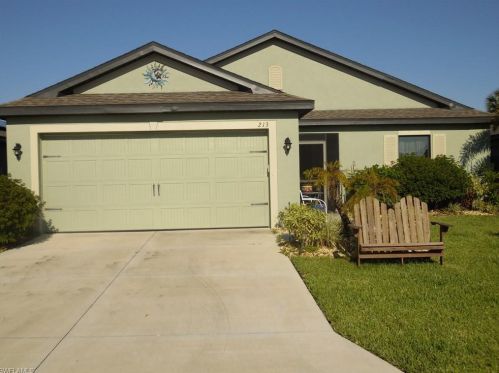 213 Shadow Lakes Dr, Lehigh Acres, FL 33974-0806