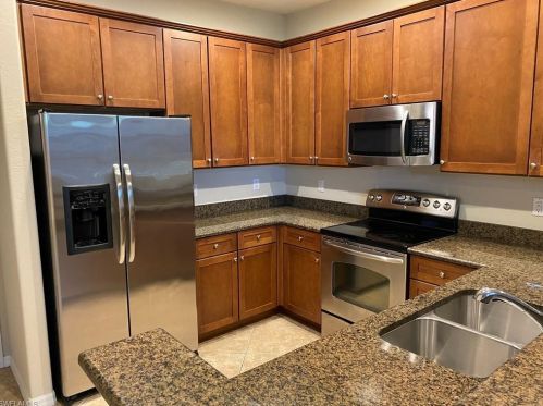 9027 Alturas Ln, Naples, FL 34113-3111