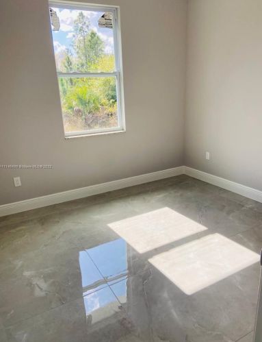 1821 Ridgemoor St, Lehigh Acres FL 33972-1080 exterior