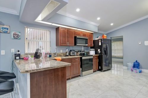 712 Hibiscus Ave, Lehigh Acres FL 33972-8000 exterior