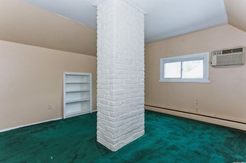 11 Lotus Ln, Westbury NY  11590-6320 exterior