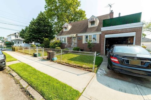 91-06 221st St, Jamaica, NY 11428-1218