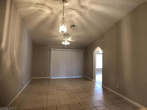 609 Hawthorne Ave, Lehigh Acres FL  33974-9712 exterior