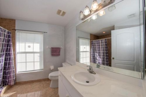 105 Zona Ave, Lehigh Acres FL 33971-1836 exterior