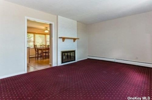 11 Lotus Ln, Westbury NY  11590-6320 exterior