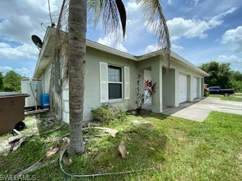 387 Bell Blvd, Lehigh Acres, FL 33974-9754