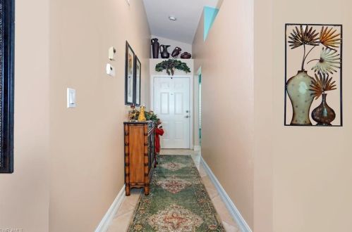 1595 Weybridge Cir, Naples, FL 34110-1097
