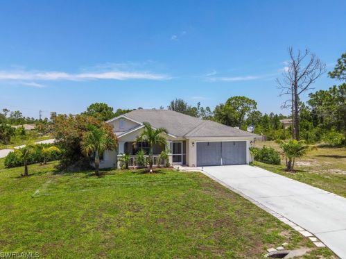 1107 Cumming St, Lehigh Acres, FL 33974-0825