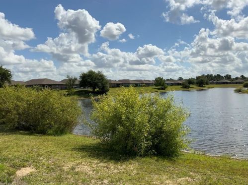 382 Shadow Lakes Dr, Lehigh Acres FL  33974-0807 exterior