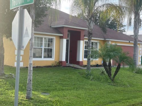 716 Vichy Ln, Kissimmee, FL 34759-7039